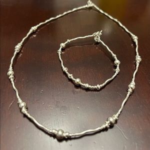 Matching silver necklace and bracelet